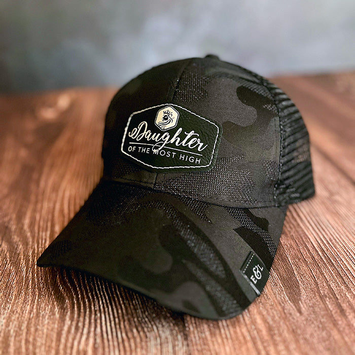 Black camouflage cap with 'Daughter of the Most High' design on the front.