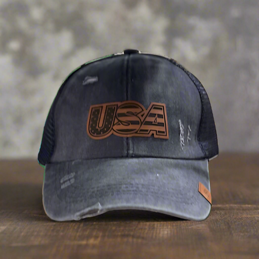 A navy ponytail hat with a 'USA' patch on the front, featuring an adjustable snapback closure.