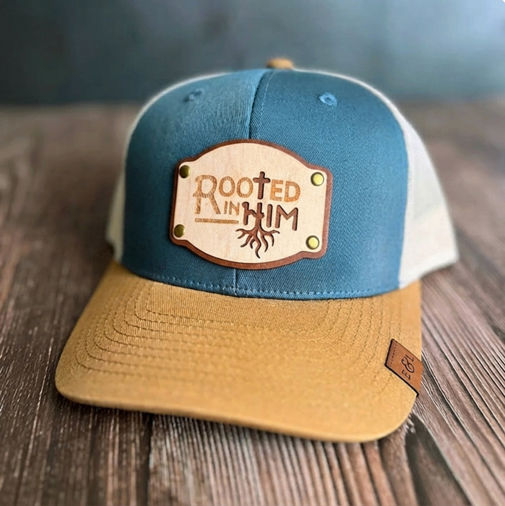 Rooted in Him Riveted Trucker Hat